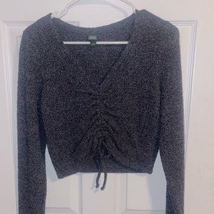 Woman’s cropped sweater blouse